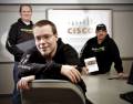 Frank Mounce, Nick Clark, and Ted Davis, top 10 finishers in the 2008-09 Cisco
Networking Academy worldwide online competition. The students are in Mike...